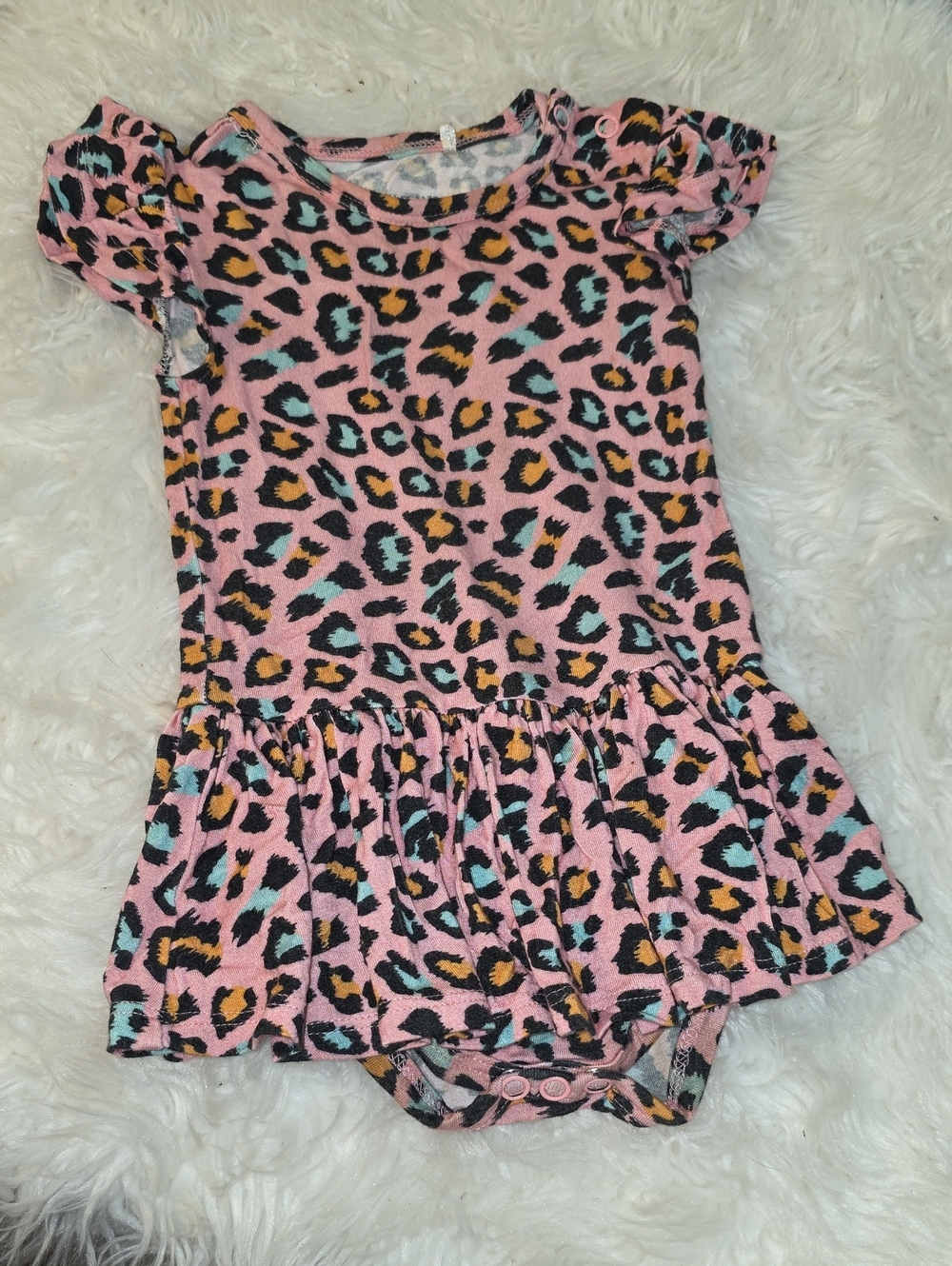 Posh Peanut Pink Leopard Print One-Piece Bodysuit with Teal and Mustard Accents